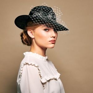 ROSIE OLIVIA HULA QUIRKY TRILBY WITH A IVORY VEIL ADORNED WITH TINY PEARLS.